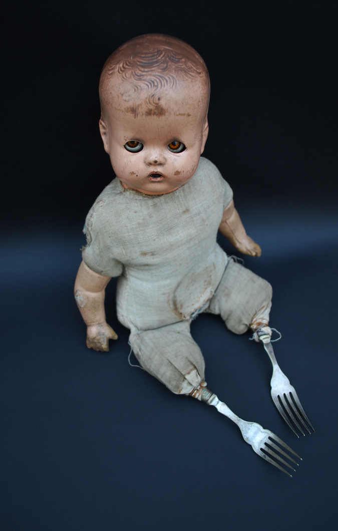 'Untitled no.2' Found and altered doll, forks