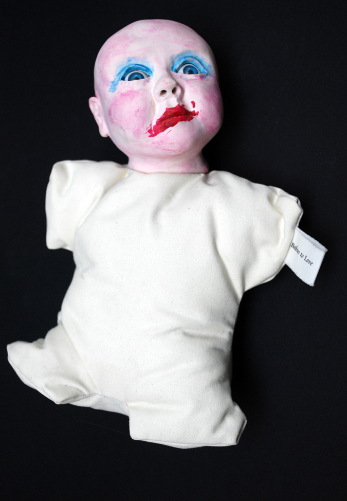 'Made up' Bisque fired earthenware, plastic eyes, textiles