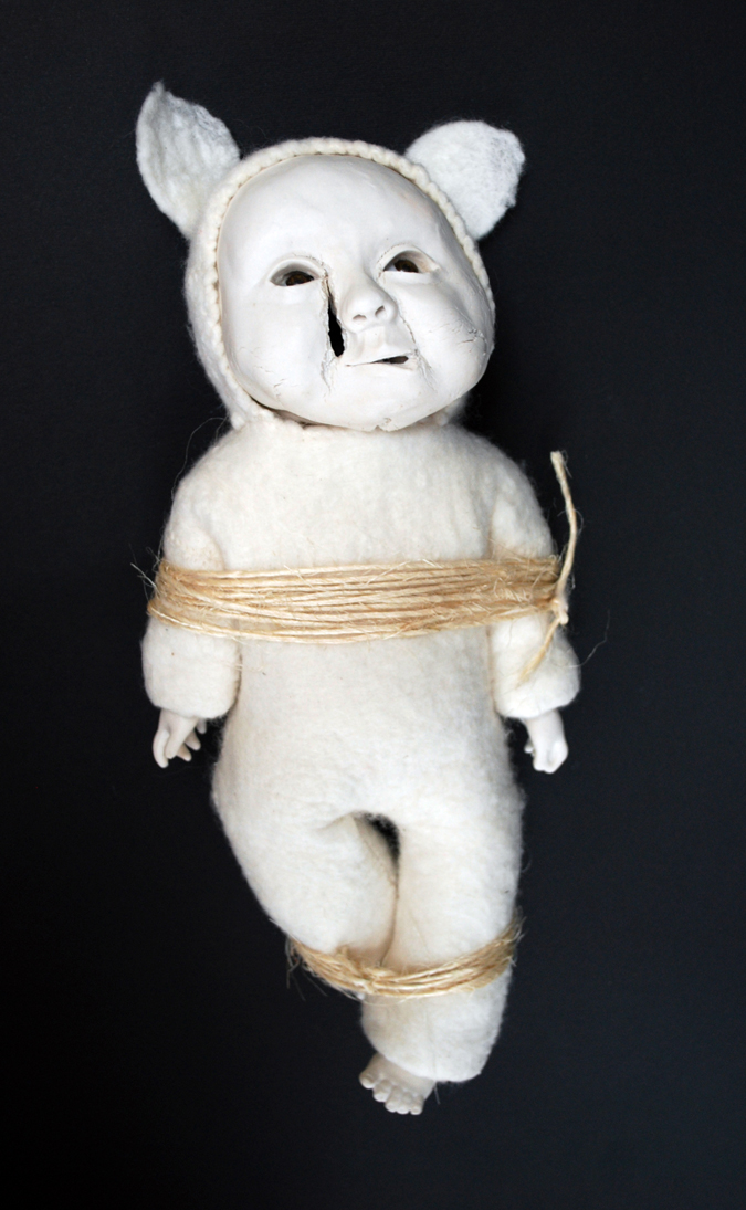 'Sarah' Porcelain, glass eyes, hand made felt, string